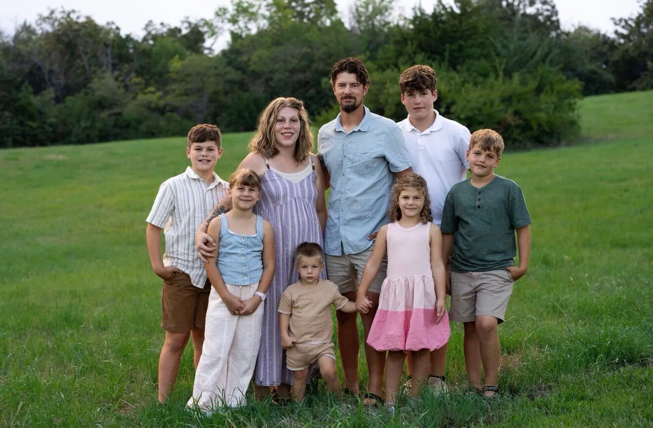 Ryan Felix and his family in a Topeka field